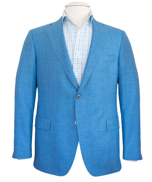 A Samuelsohn Bennet Contemporary Fit Blazer with a checkered dress shirt underneath, showcased on a mannequin, exemplifies hand-tailored production.