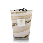 A Baobab Collection Sand Siloli Candle in a decorative glass container with beige and golden swirling patterns, isolated on a white background, enhanced with the scent of cedarwood tonka bean.