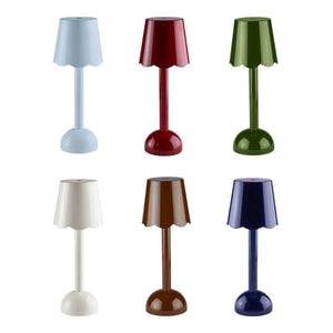 Six Addison Ross Scallop LED Lamps are arranged in two rows; each cordless bedside lamp features a unique shade color: light blue, red, green, white, brown, and dark blue.
