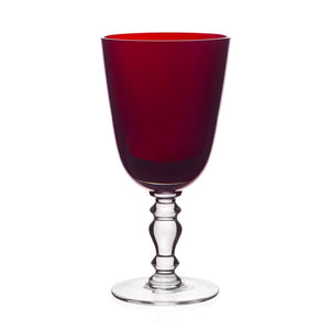 A Fanny Scarlet Drinkware Collection deep red wine glass with a clear, decorative stem and base, crafted in vibrant scarlet barware.