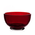 A deep red, fluted Fanny Scarlet Drinkware Collection bowl with a pedestal base, perfect as part of a collection of jewel-coloured barware.
