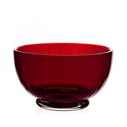 A deep red, fluted Fanny Scarlet Drinkware Collection bowl with a pedestal base, perfect as part of a collection of jewel-coloured barware.