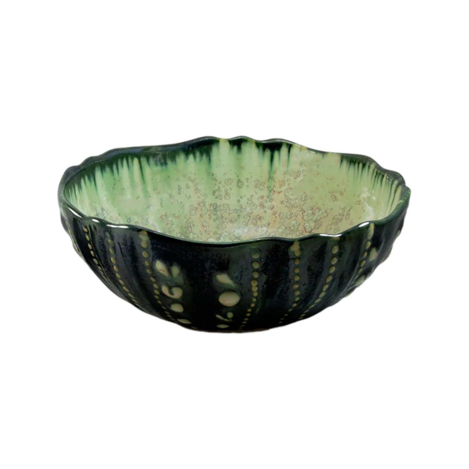 The Mint & Charcoal Serveware Collection by AE Ceramics features a green ceramic bowl with a scalloped rim and textured, speckled glaze—blending style and function for any occasion.
