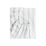 The Gooselings Seaside Stripes Bedding is a blue and white striped fitted sheet with elastic edges, crafted from pure materials and OEKO-TEX certified, shown folded against a plain white background.