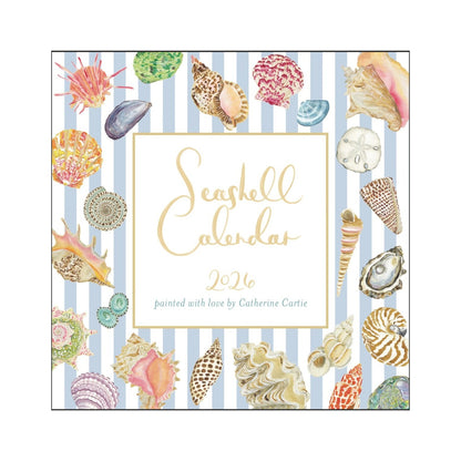 The Catherine Cartie 2026 Seashell Calendar features vibrant shell art and illustrated seashells on a blue and white striped square cover—a charming beach-themed calendar for your desk or brass easel stand.