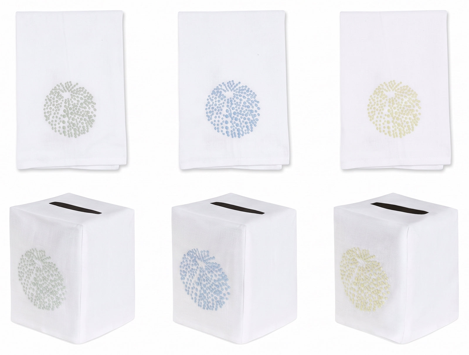 Six white premium linen pieces from Haute Home’s Sea Urchin Bath Collection, featuring coral-inspired patterns: three hand towels above in assorted pastel shades, and three matching tissue box covers below with top slots—an elegant addition to your home décor.