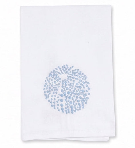 Elevate your refined home décor with the Sea Urchin Bath Collection by Haute Home—a premium linen white cloth napkin adorned with a light blue circular dotted pattern at its center, beautifully displayed against a plain background.