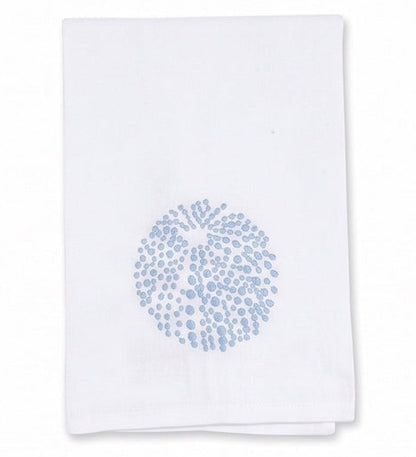 Elevate your refined home décor with the Sea Urchin Bath Collection by Haute Home—a premium linen white cloth napkin adorned with a light blue circular dotted pattern at its center, beautifully displayed against a plain background.