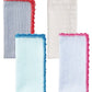 The Kim Seybert Seersucker Napkin Set includes four cotton napkins with unique striped or textured patterns and hand-crocheted red, blue, or pink borders. Ideal for adding charm to any table setting.