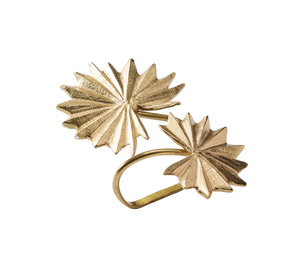 The Kim Seybert Palmera Napkin Ring in Gold features two textured, fan-shaped leaf designs joined by a curved band, ideal for elevating tropical decor or adding elegance to modern table settings. Shown on a white background.