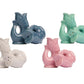 Four pairs of Fish Salt & Pepper Shakers by The Original Gluggle Jug, in blue, green, white, and pink, are arranged in two rows on a white background—a playful set inspired by the iconic Gluggle Jug design.