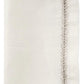 A folded white linen napkin with silver embroidery along the edge, labeled "White/Silver" at the bottom, from Kim Seybert's Jardin Napkin Set.