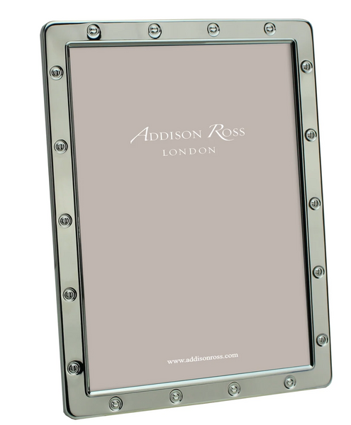 An Addison Ross Silver Plated Locket Frame Collection, standing upright with a dove grey velvet backstand, displaying the brand name in the center and the website address at the bottom. This elegant frame comes gift boxed.