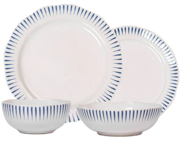 White ceramic dinnerware set from the Juliska Sitio Stripe Delft Blue Collection, featuring radiant stripes, including two plates and two bowls.