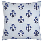 The Lucy Indigo Pillow by John Robshaw features a white background with light blue vertical stripes and dark blue floral motifs—an indigo accent that brings charm to any space.