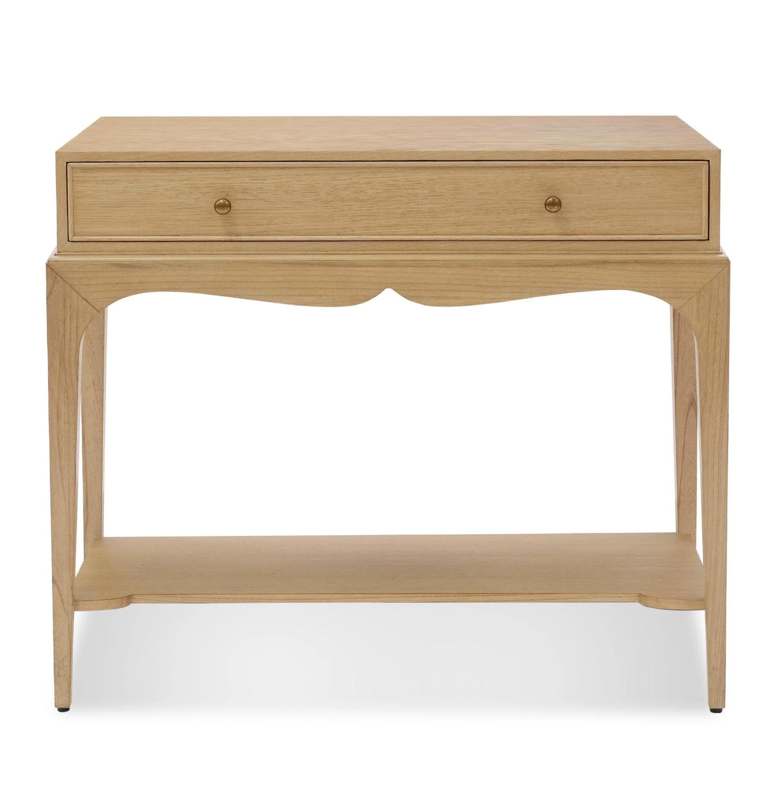 The Bunny Williams Isabella Side Table features a wide drawer with two round knobs, a curved apron detail, and an open lower shelf in a grey-washed Oak finish.