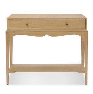 The Bunny Williams Isabella Side Table features a wide drawer with two round knobs, a curved apron detail, and an open lower shelf in a grey-washed Oak finish.