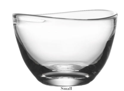 Explore the modern charm of the Simon Pearce Barre Bowl Collection. The graceful, asymmetrical design of this "Small" glass bowl fuses art with function, making it an eye-catching centerpiece and a practical addition to any contemporary décor.