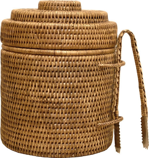 A cylindrical woven basket with a tightly fitted lid, a handle on one side, and a stylish rattan finish, the Matahari Rattan Ice Bucket with Liner in Antique Brown Collection.