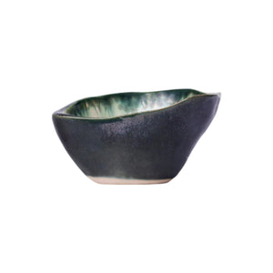 The Mint & Charcoal Serveware Collection by AE Ceramics features handcrafted ceramic bowls with a dark matte exterior, green-glazed interior, and organic shape—blending style and function for any dining occasion.