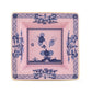 A square porcelain dish from Ginori 1735’s Oriente Italiano Azalea Serveware & Decor Collection, featuring a pink background, blue floral and bee motifs, and a slim gold rim—ideal for adding elegance to your home.