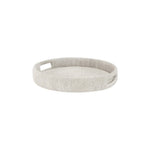 The Monarch Round Tray Collection by PALECEK features a round, light beige seagrass rope tray with two rectangular cut-out handles and a sturdy metal frame, shown on a plain white background.