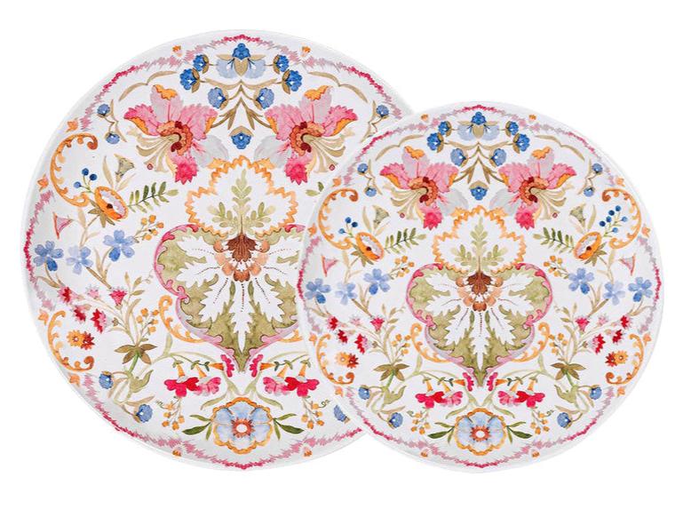 The Sofia Melamine Dinnerware Collection by Juliska features two round plates with intricate, colorful floral patterns on white, adding garden-inspired charm and symmetrical designs to your outdoor gatherings.