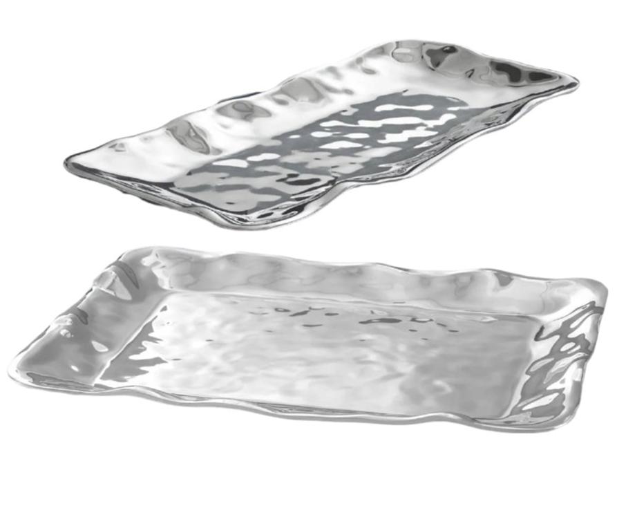 The Beatriz Ball Soho Brooklyn Rectangular Tray Collection features two hammered aluminum alloy trays with slightly wavy edges, ideal for family gatherings and shown on a white background.