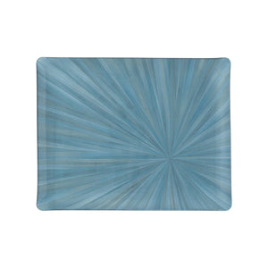 The Soleil Tribeca Collection rectangular tray by HestiaLiving features a blue radial sunburst on white, perfect for brightening any table setting.