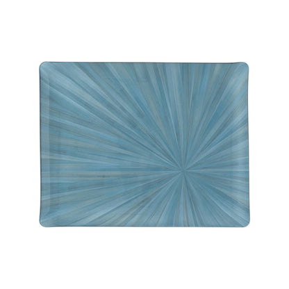 The Soleil Tribeca Collection rectangular tray by HestiaLiving features a blue radial sunburst on white, perfect for brightening any table setting.
