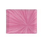 The Soleil Tribeca Collection rectangular tray by HestiaLiving features a pink sunburst motif on white, with radiant lines from a central point—an ideal way to brighten any table setting.
