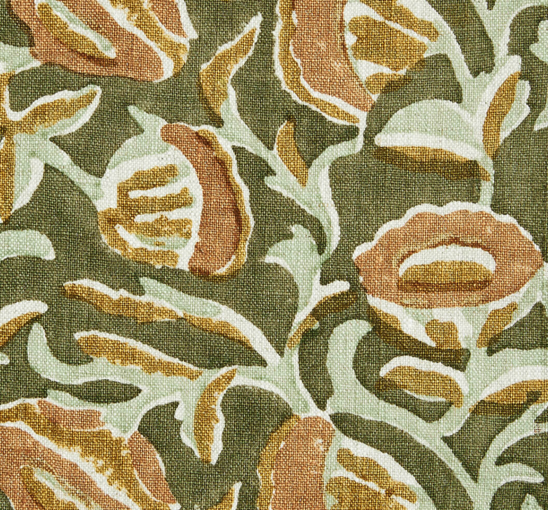 A close-up of fabric with an abstract floral pattern in green, brown, and cream—ideal for upholstering the Bunny Williams Stella Stool.