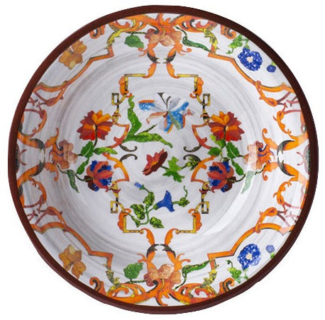 The Pancale White Melamine Dinnerware Collection by Mario Luca Giusti features round plates with a white background, colorful floral and butterfly patterns, and orange, green, and blue decorative borders.