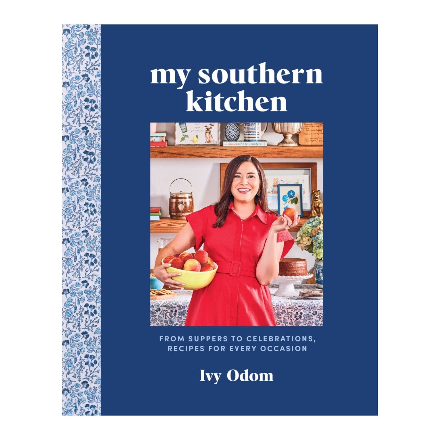 Cover of "My Southern Kitchen" by Abrams, showing the author Ivy Odom holding apples in a kitchen with decorative shelves in the background.