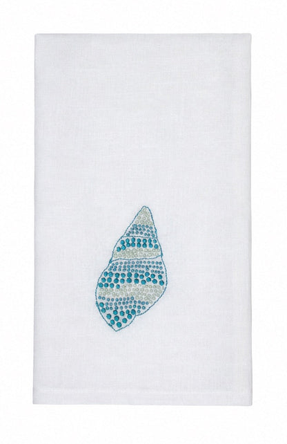 Add a touch of elegance to your home décor with the Haute Home Speckled Conch Coaster & Bath Collection—featuring pristine white Italian linen adorned with an embroidered blue and teal seashell motif at the center.