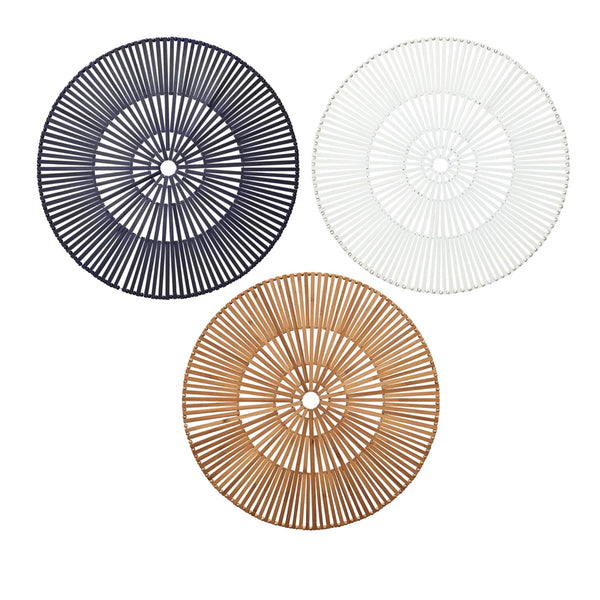 Three Kim Seybert Spoke Placemats in dark grey, white, and light brown are arranged in a triangular formation against a white background.