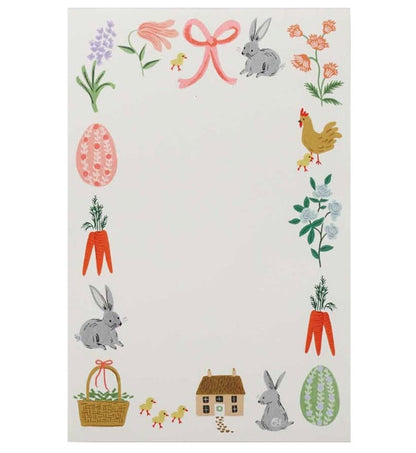 The Rifle Paper Co. Spring Farm Notepad features a charming border of bunnies, carrots, flowers, eggs, chicks, a house, and basket around a blank center—ideal for daily notes with easy tear-off sheets.