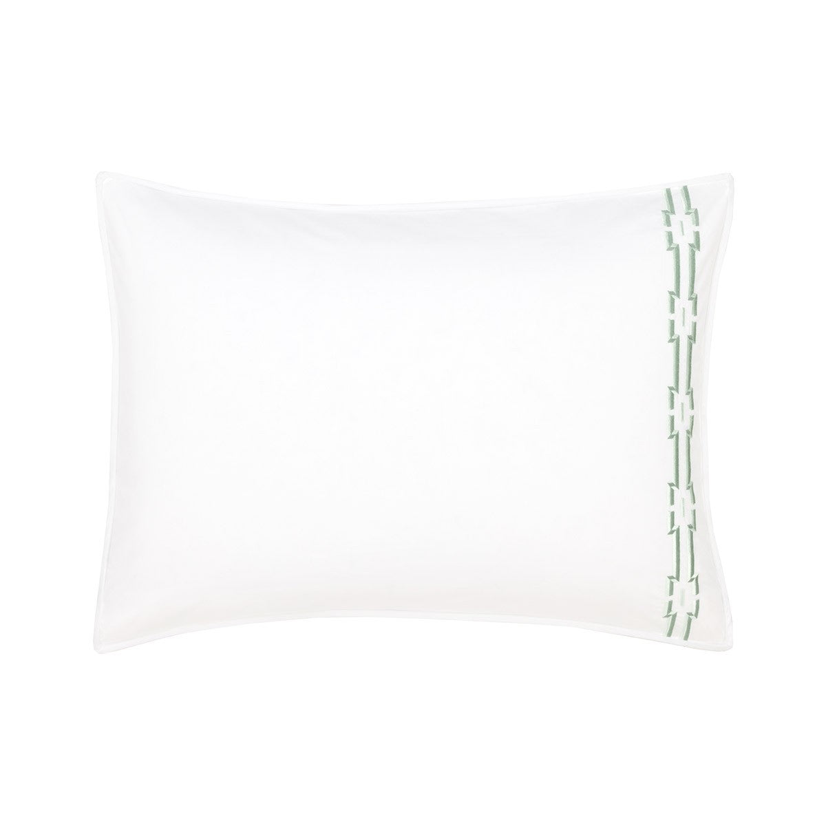 The Couture Tuileries Bedding Collection by Yves Delorme features a white PIMA cotton percale pillowcase with minimalist geometric green embroidery inspired by Tuileries Garden topiary along the right edge.