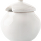 The Juliska Puro Whitewash Dinnerware Collection features a white ceramic sugar bowl with a rounded shape, lid, and spoon notch—ideal for teatime or enhancing a neutral table setting.