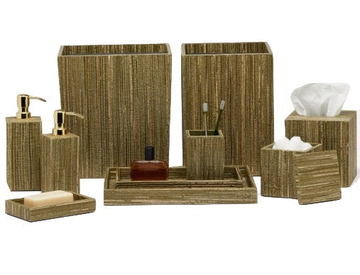 Elevate your bathroom with the Pigeon & Poodle Sumter Bath Collection, featuring two soap dispensers, a toothbrush holder, tissue box, cotton swab holder, Sumter tray, soap dish, and two wastebaskets. Each piece boasts a textured brown elegance.