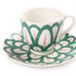 Decorative cup and saucer with Themis Z Symi Green and Pink Collection, featuring green and red patterns on a white background.