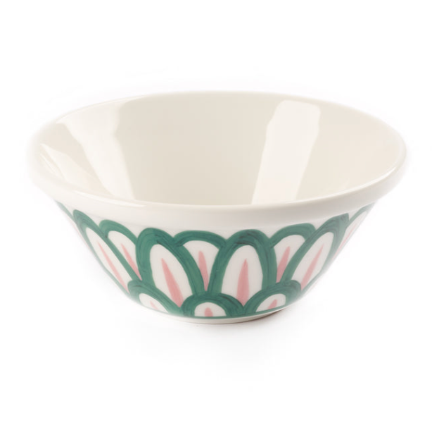 Ceramic bowl with Themis Z Symi Green and Pink Collection pattern on white background.