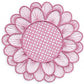 The Symi Rattan Placemat Collection by Themis Z features a round, pink placemat with a woven center and petal-shaped edges, handcrafted by Colombian artisans and shown on a white background.