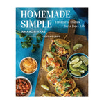 Cover of "Homemade Simple: Effortless Dishes for a Busy Life" by Abrams, showing tacos, lime wedges, shredded cheese, and salsa on a wooden board and blue background—ideal inspiration for healthy family meals and easy recipes.