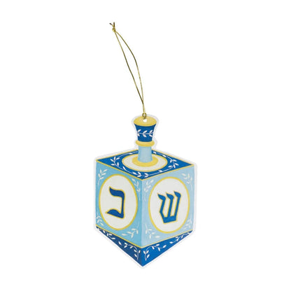 Introducing the Caspari Dreidel Ornament Tag—a blue and white dreidel ornament adorned with Hebrew letters and finished with a gold hanging cord for easy display. This delightful piece also features ornamental tags with blank backs, ideal for adding your own personalized message or greeting.