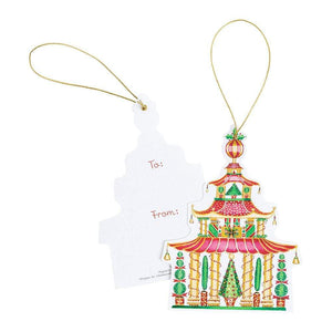 The Caspari Christmas Pagodas Gift Tag Set includes two pagoda-shaped die-cut tags with gold string—one with a festive ornament design, the other with "To:" and "From:" sections on premium white cardstock.