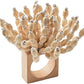 The Kim Seybert Reed Napkin Ring features multiple short wooden dowels, each topped with a small white bead, making it perfect for adding coastal-inspired style to your table setting.