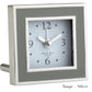 The Square Silver Alarm Clock by Addison Ross features a taupe and silver frame, white face, black numerals, and three hands—ideal for your bedside table.