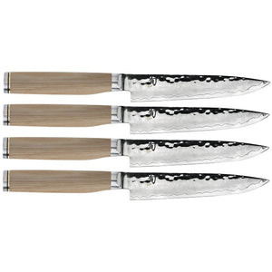 Four identical knives from the Shun Premier Blonde Steak Knife Set, 4-Piece, each featuring a wooden handle and textured stainless steel blades with a VG-MAX cutting core, are aligned horizontally.