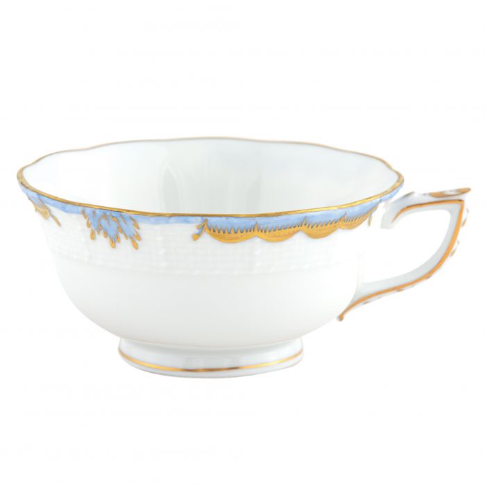 Herend Princess Victoria Light Blue Collection teacup, featuring white porcelain with gold trim, blue accents, and a right-side handle, shown on a plain white background.